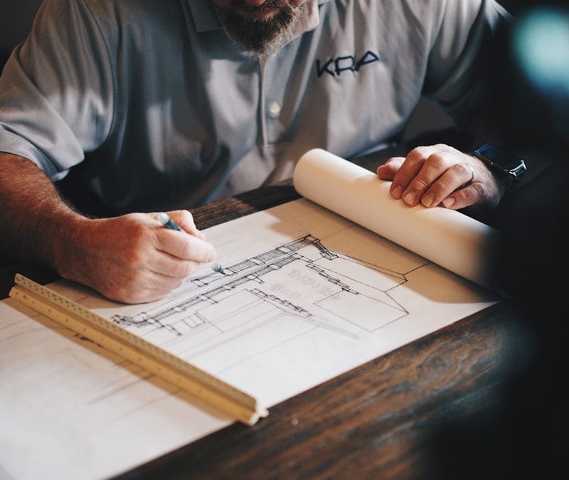 How Do I Manage Subcontractors During A Large Renovation Project? Construction project manager managing subcontractors on a large renovation site in Jacksonville FL